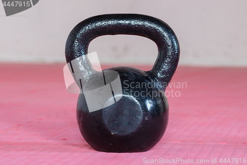 Image of Black kettlebell ina gym