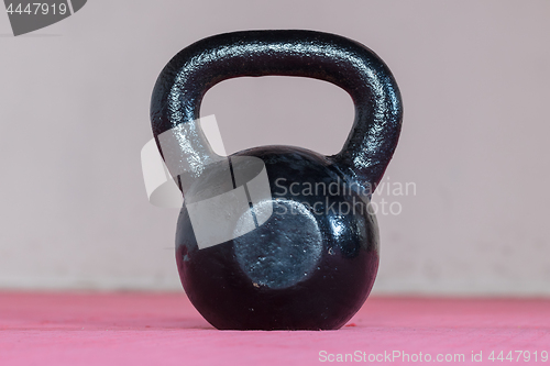 Image of Black kettlebell ina gym