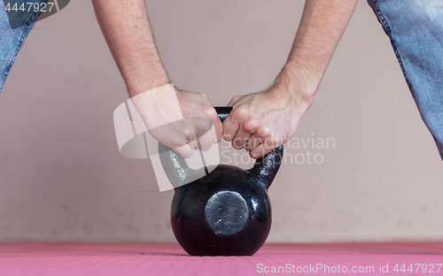 Image of Black kettlebell ina gym