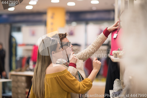 Image of best friend shopping in big mall