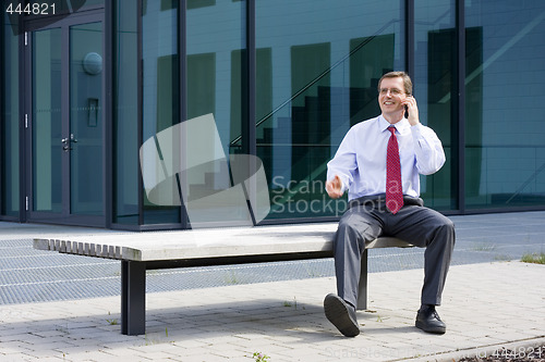 Image of Businessman with mobile phone