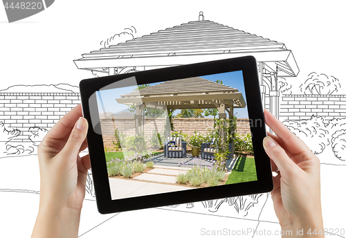 Image of Female Hands Holding Computer Tablet with Photo of Pergola on Sc