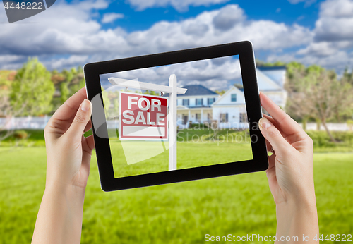 Image of Female Hands Holding Computer Tablet with Home For Sale Sign on 