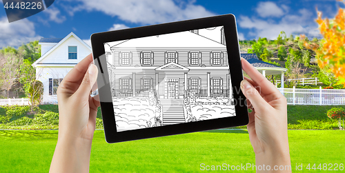 Image of Female Hands Holding Computer Tablet with House Drawing on Scree