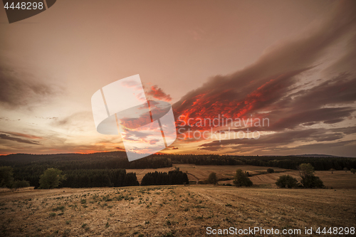 Image of Amazing sunset over dry plains