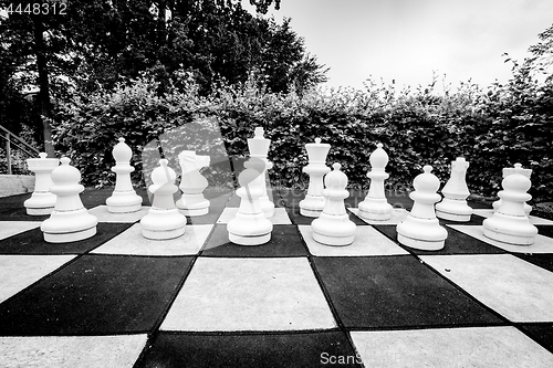 Image of Black and white photo of a game of chess