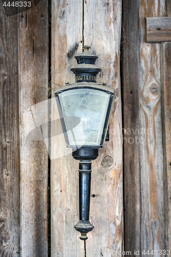 Image of Vintage lamp with dusty glass hanging