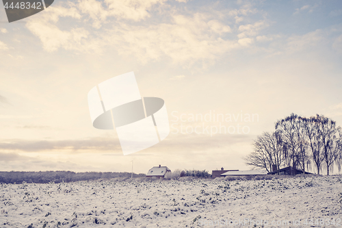 Image of Winter landscape with a small farm house