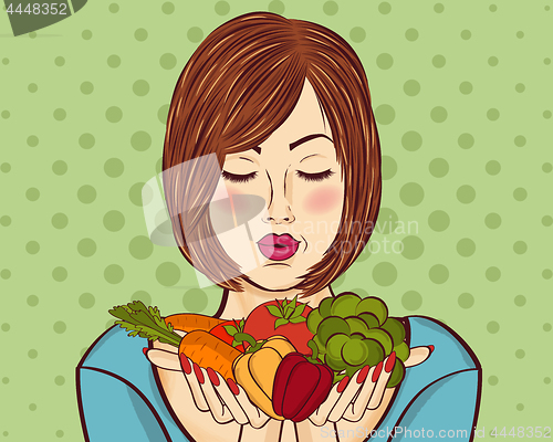 Image of beautiful red-haired lady with vegetables in his hands