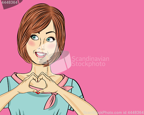 Image of Pop art woman making heart sign with hands. Comic woman . Pin up