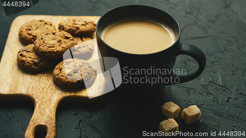 Image of Cup of coffee with cookies