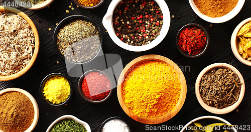 Image of Bowls with colorful spices 