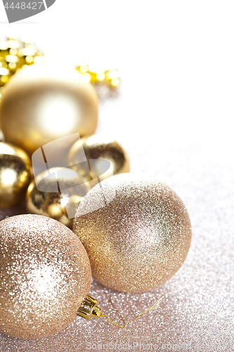 Image of Christmas golden glitterdecorations.