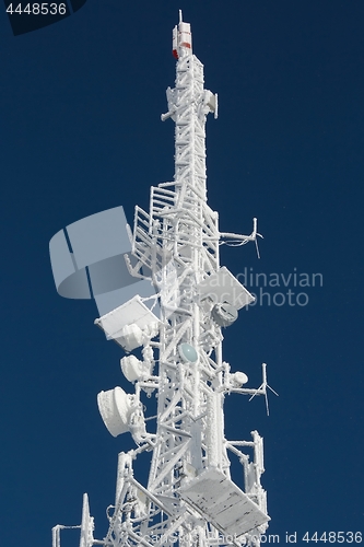 Image of Transmitter tower frozen in winter frost