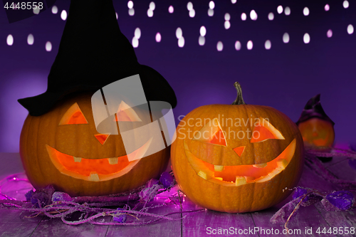 Image of close up of halloween pumpkins on table