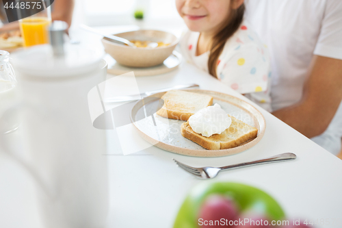 Image of toasts with poached egg on plate