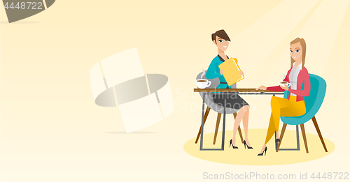 Image of Two businesswomen during business meeting.