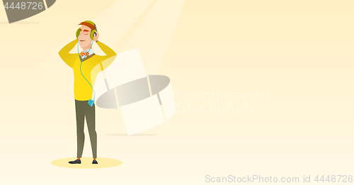 Image of Young man in headphones listening to music.