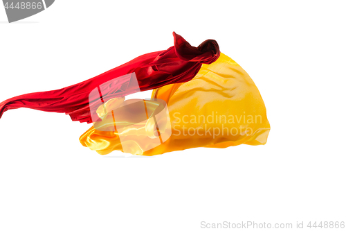 Image of Smooth elegant transparent yellow, red, cloth separated on white background.