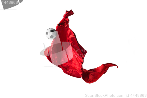 Image of Soccer ball and Smooth elegant transparent red cloth isolated or separated on white studio background.