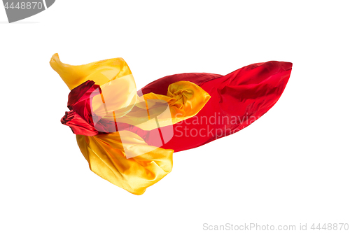 Image of Smooth elegant transparent yellow, red, cloth separated on white background.