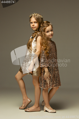 Image of The fashion portrait of young beautiful teen girls at studio