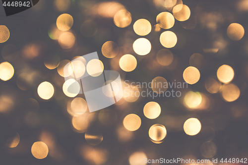 Image of Golden Christmas bokeh lights glittering