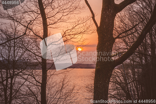 Image of Sunrise landscape in the morning over a lake