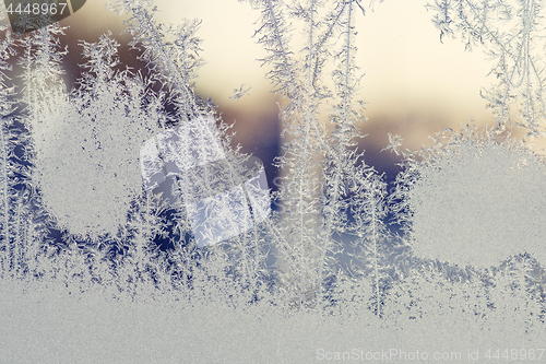 Image of Frozen window in the winter on a cold morning