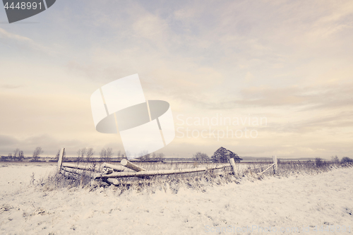 Image of Winter scenery with a wooden fence