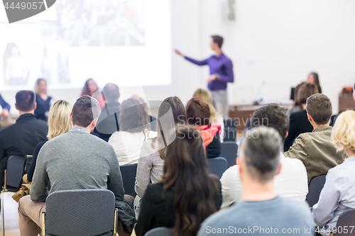 Image of Speaker giving presentation on business conference.