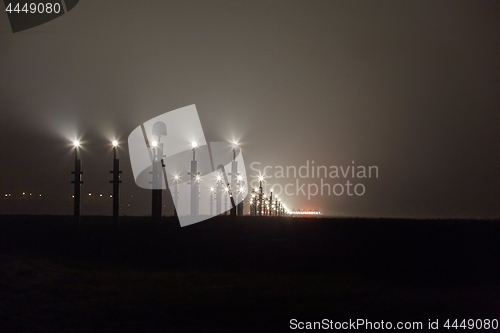 Image of Runway lights at night