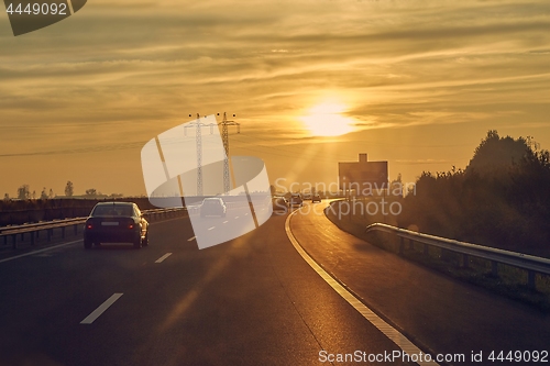 Image of Driving in sunset