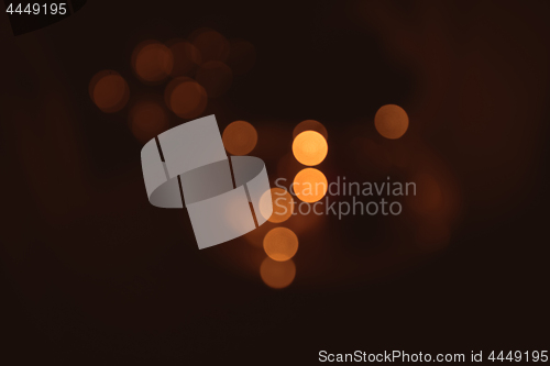 Image of Golden bokeh on a dark brown background