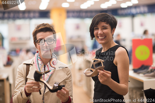 Image of best friend shopping in big mall