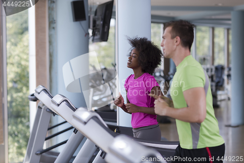 Image of people exercisinng a cardio on treadmill