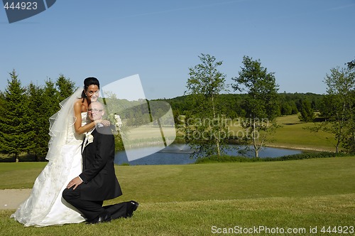 Image of Wedding - Groom on knee