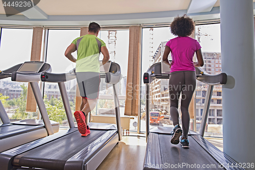 Image of people exercisinng a cardio on treadmill in gym