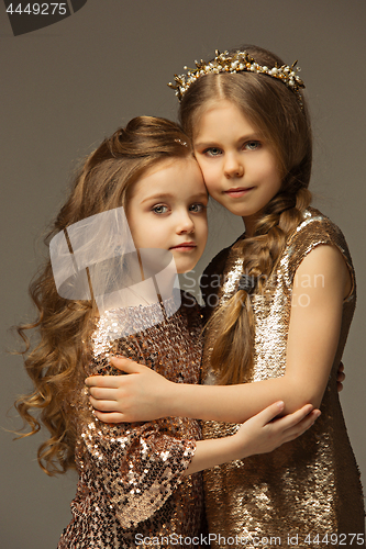 Image of The fashion portrait of young beautiful teen girls at studio