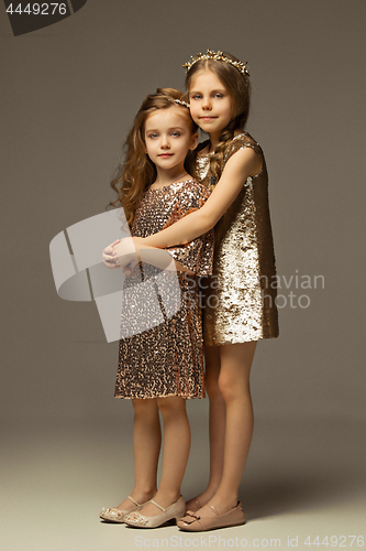 Image of The fashion portrait of young beautiful teen girls at studio