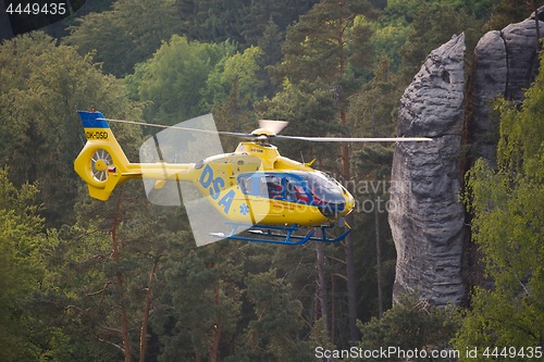 Image of Rescue helicopter in the mountains