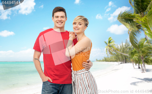 Image of happy couple hugging over white background