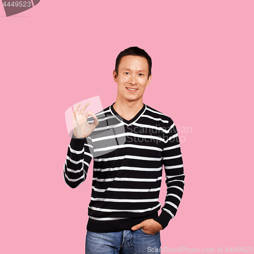Image of Asian Man In Striped Pullover