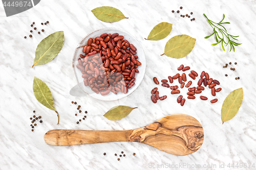 Image of Red beans and spices on marble background