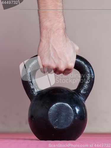 Image of Black kettlebell ina gym