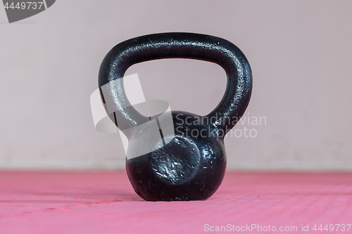 Image of Black kettlebell ina gym