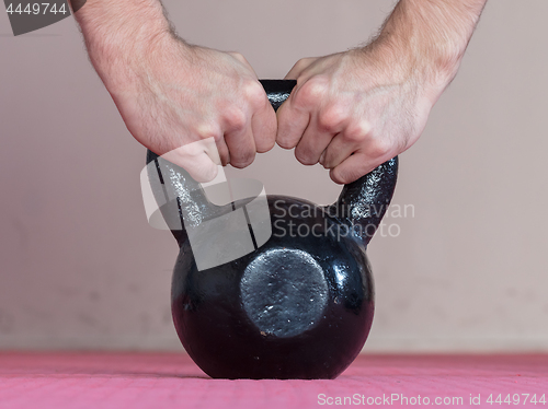 Image of Black kettlebell ina gym