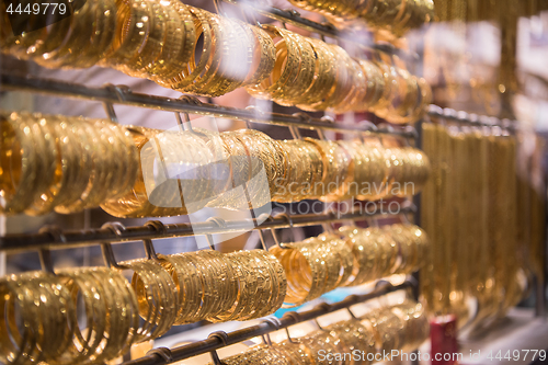 Image of gold jewelry in the shop window