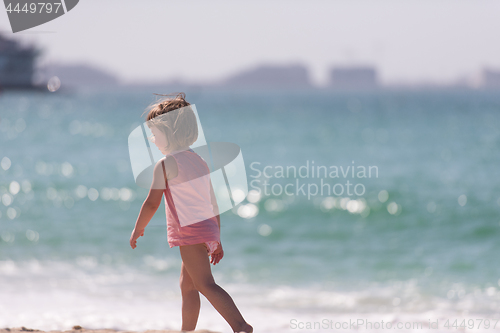 Image of little cute girl at beach