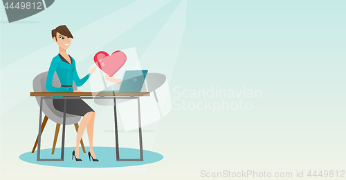 Image of Young woman using a laptop online dating.